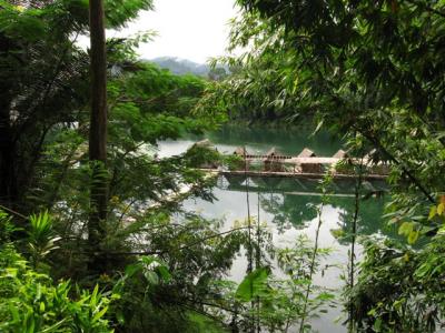 looking from the toilet down to the floating raft houses