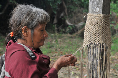 Yuqui woman knotting a fiber bag - Bia Recuate, a Yuqui village on the Rio Chimore