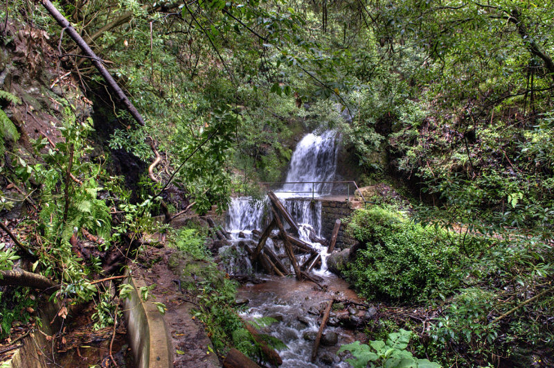 Blocked levada path and waterfall