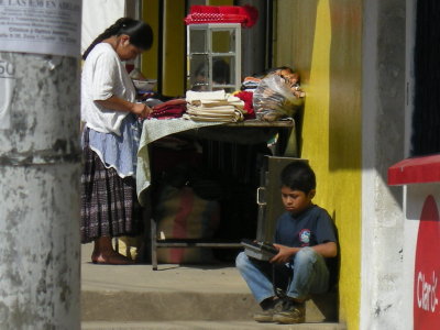 Kids work hard in Guatemala. Selling phone calls on the streets of Coban, Guatemala.