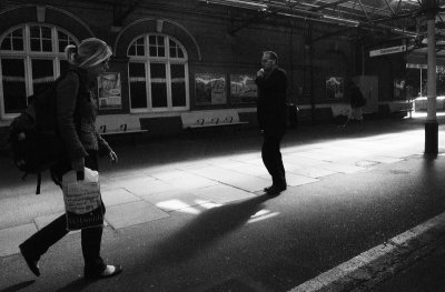 Girl with bag  bloke on platform 1.jpg