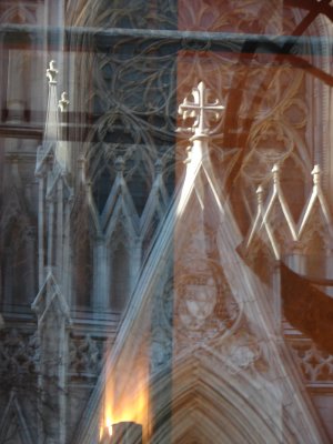 Reflections Of St. Patricks Cathedral From Rockerfeller Center.JPG