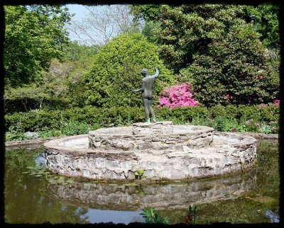 Statue In A Pond