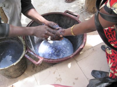 660 Habyly gets her hand washed and the water turned blue.jpg