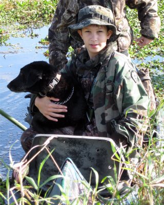 Danny in the Canoe with Casey.jpg