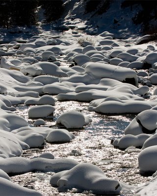 Snow Covered Boulders in the River.jpg