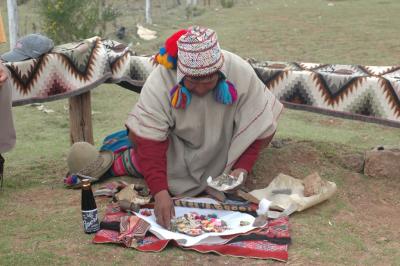 The shayman Pedro preparing ceremonial offering