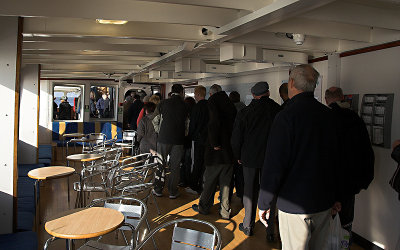 Queue to get off the ferry