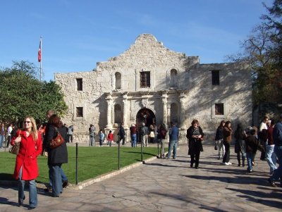Tourists visit the Alamo