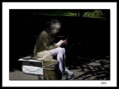 Mime -  texting in Central Park, NYC
