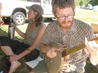 Matt playing a banjo that Anna made
