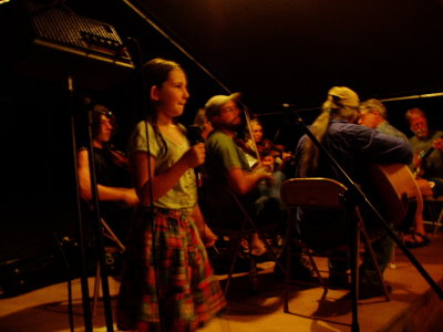 Little Maggie Neatherlin calling a dance.