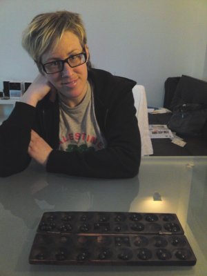 Playing Bao (African board game)