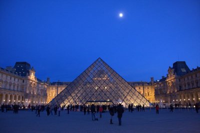 Pyramid of the Louvre under a moonlit sky, Paris, France