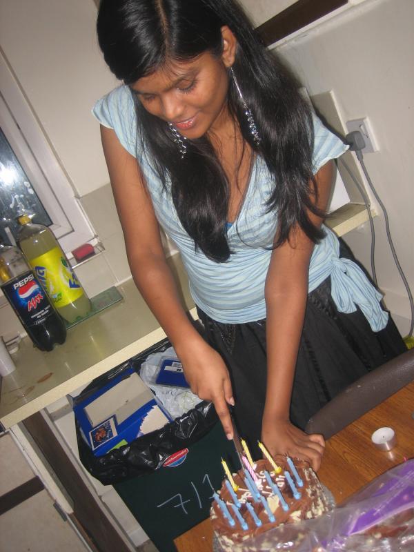 my roommate Vidya ready to slice her Birthday Cake 