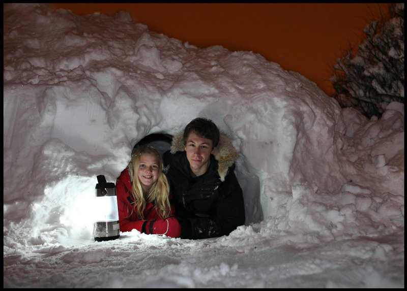 Madelene & Marcus digging a snow cave in our garden (in the middle of the night!)
