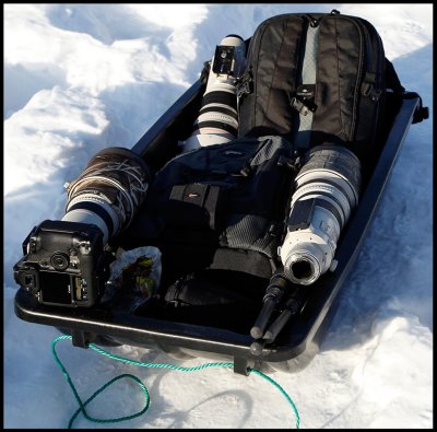 A perfect way of bringing your cameragear in snowy conditions.....(and it will save your back)