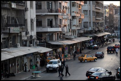 Evening in central Damascus, UN car present