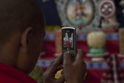 Monk with mobile