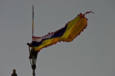 Changing the flag atop the temple