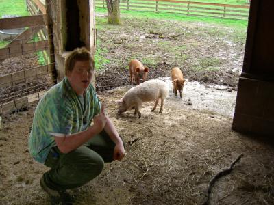Skylar with the little pigs