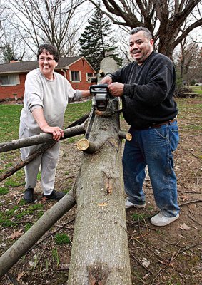Renee helps Ernie with tree cutting s 3-24-2010.jpg