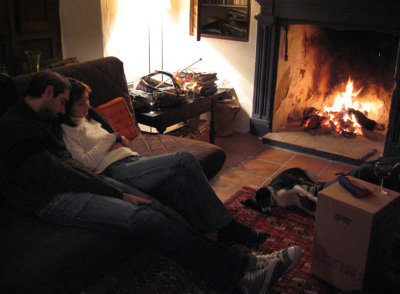 enjoying Eli's fireplace, Dec 2006