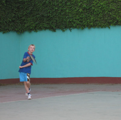 Jamie playing tennis