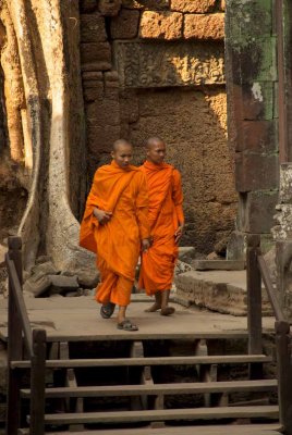 Monks at sundown Angkor Wat