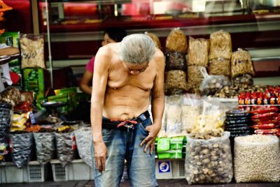 Slumped over drunk, Bangkok, Thailand