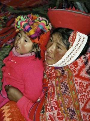 mother and daughter cold night in the mountains Peru