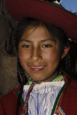 nice young lady. home made of mud