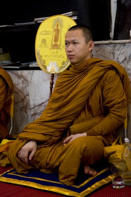Monk In Thought as the Prayers are Read