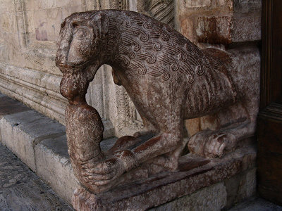 Stone lion flanking the main portal .. A3942