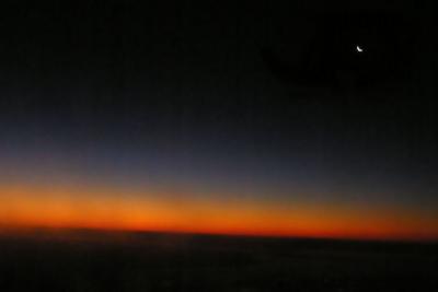 12-27-05 sunrise with moon from air.jpg