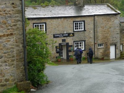 wet walkers arrive at horsehouse pub
