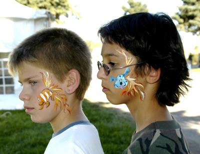 The annual face painting at the fair. This year, with Sean, for a goof -- flames coming from Blue of 'Blue's Clues' fame.