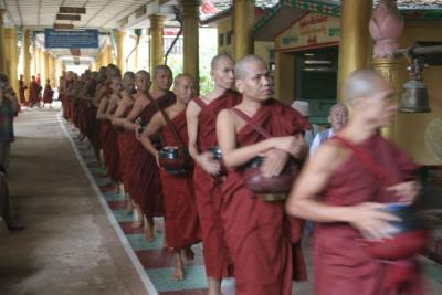Monks Queuing from the Left at Kyakhat Wine Monastery