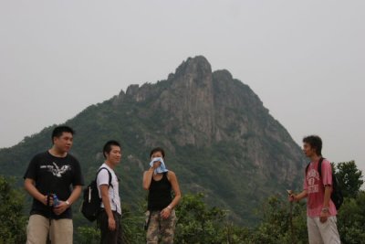 Mike, Gary, Winnie, and Eric in Front of Lion Rock