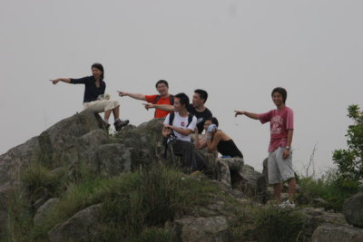 Gang Pointing to Hong Kong from Lion Rock (Close Up)