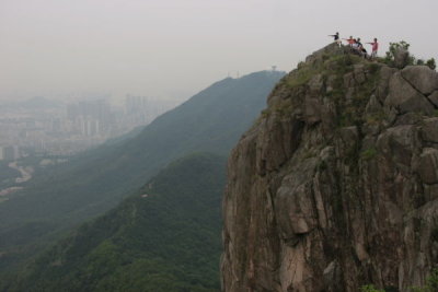 Gang Pointing to Hong Kong from Lion Rock