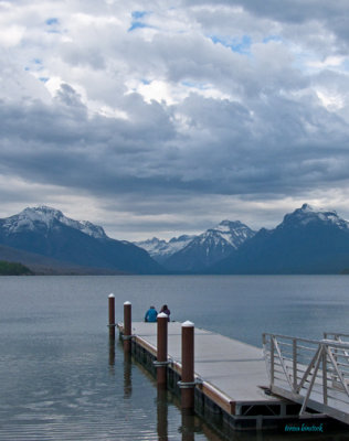 z P1080553 Two people watch storm arriving over Lake McDonald in Glacier.jpg