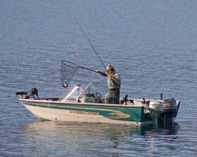 zP1020865 Fish and fisherman in Lake McDonald.jpg