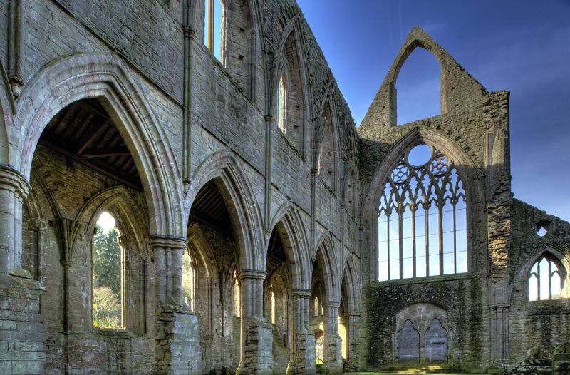 The arched cloister leading to the west door and front