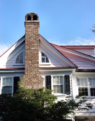 Side chimney with old windows.jpg