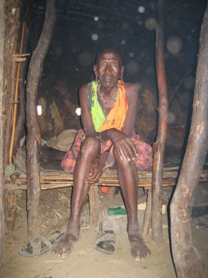Pemba's father.  The cowhide he's sitting on is where I slept.