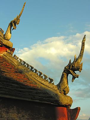 Roaring dragon-- roof of Laotian temple