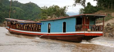 slow boat commuting between Luang Prabang and Houeisay