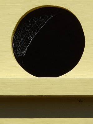 Yellow Birdhouse with Web