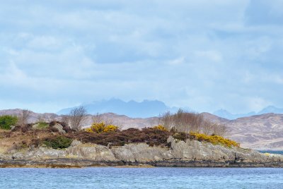 Samalaman Island with the Cuilin Hills on Skye beyond